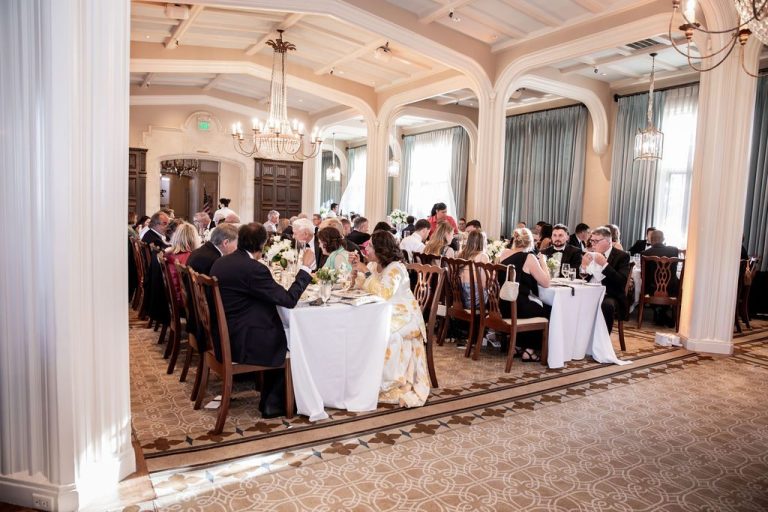 Wide view of guests seated at reception tables
