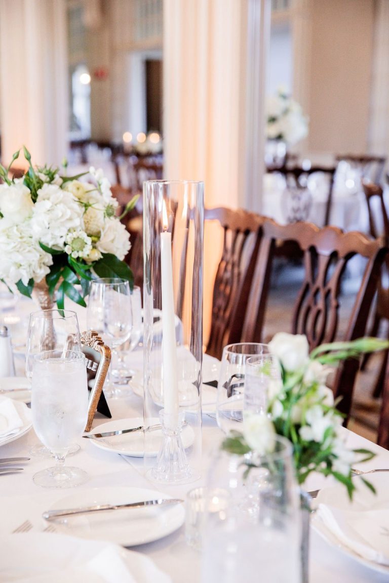 Elegant tablescape with white florals and crystal glassware